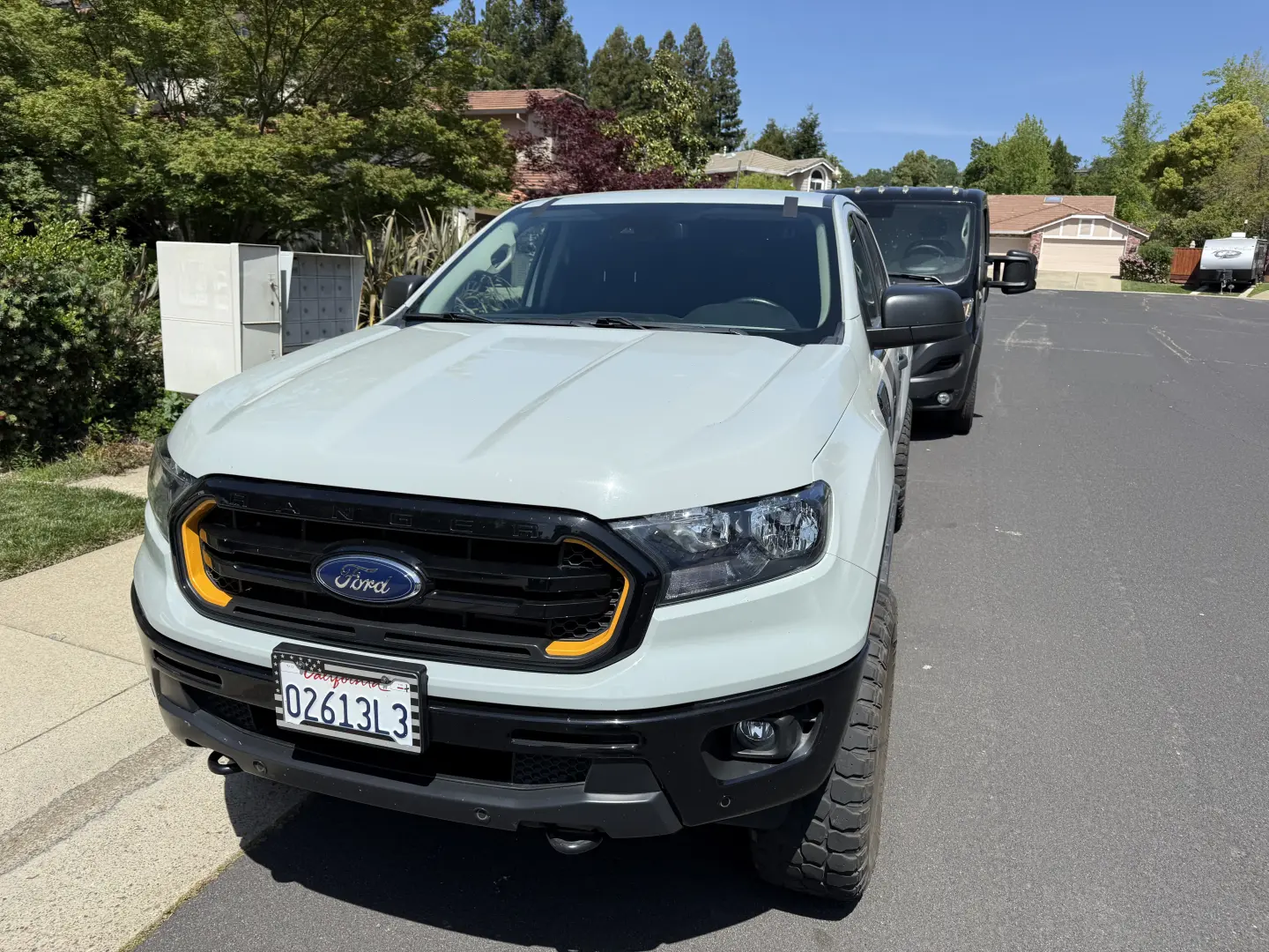 Ford Escape with fresh windshield install and blue tape in Loomis, CA