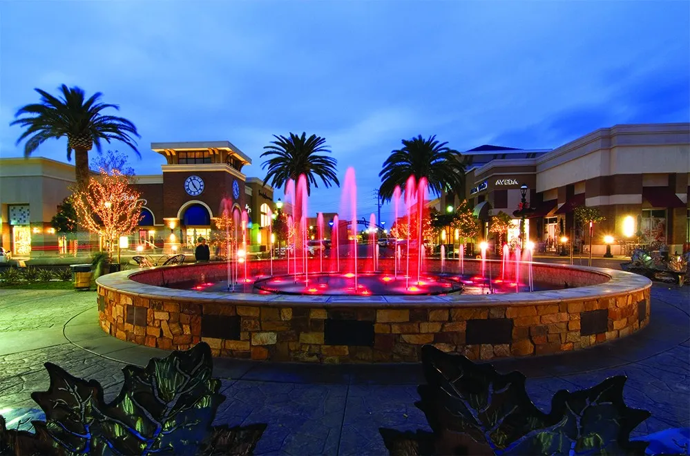 The Fountains at Roseville lit up at night