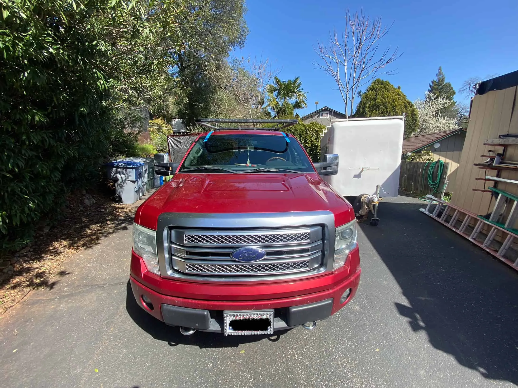 Windshield replacement on a red Ford F-150 in Roseville, CA