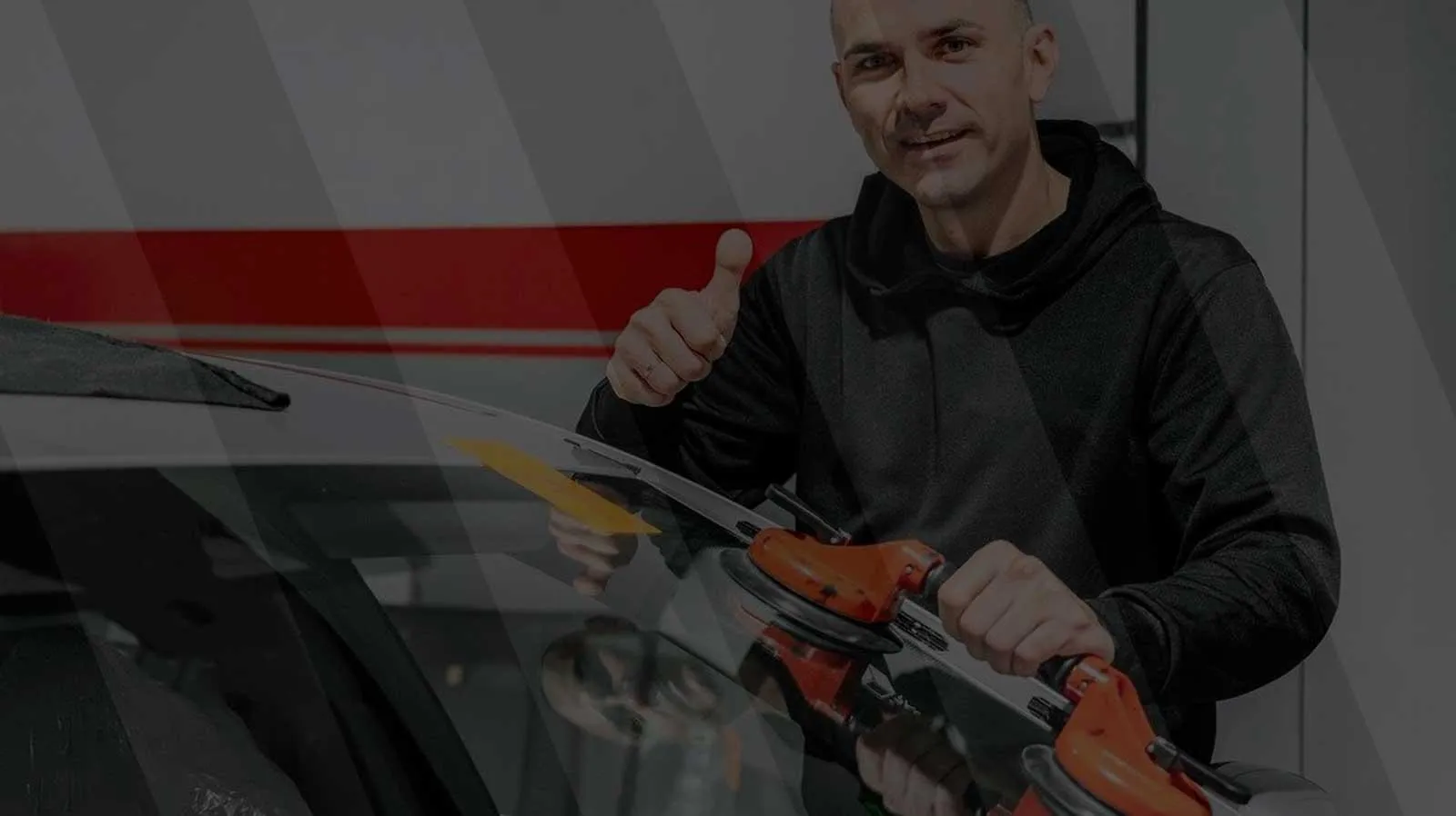 Very Smooth Auto Glass technician installing windshield on vehicle